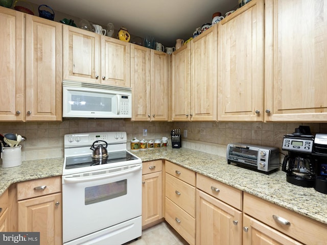 30619 Cedar Neck Rd Unit 1101, Ocean View, DE 19970 - kitchen with white appliances, light brown cabinetry, and decorative backsplash