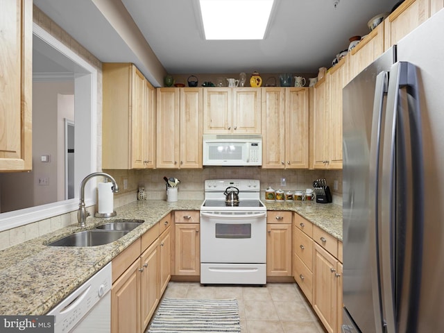 30619 Cedar Neck Rd Unit 1101, Ocean View, DE 19970 - kitchen featuring white appliances, a sink, light brown cabinets, and light tile patterned floors