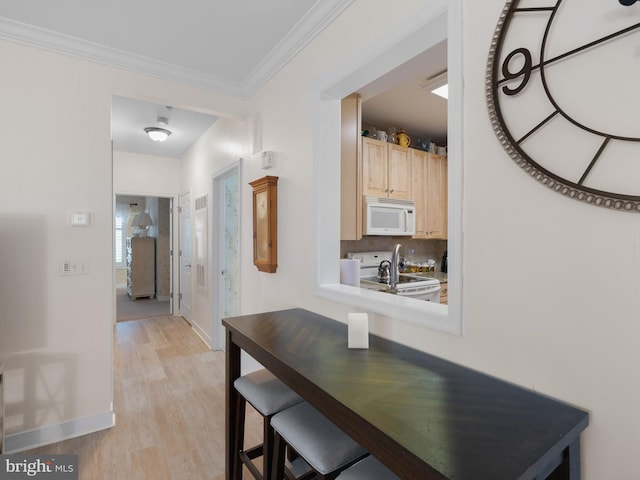 30619 Cedar Neck Rd Unit 1101, Ocean View, DE 19970 - hall with light wood-type flooring, baseboards, and ornamental molding