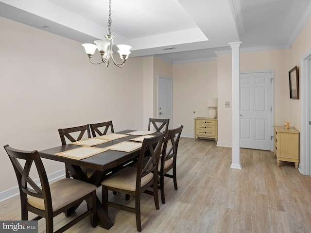 30619 Cedar Neck Rd Unit 1101, Ocean View, DE 19970 - dining room with light wood-type flooring, a chandelier, baseboards, ornamental molding, and decorative columns