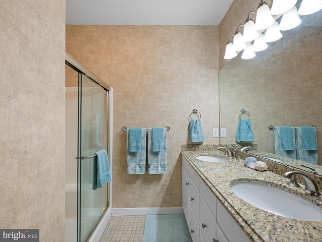30619 Cedar Neck Rd Unit 1101, Ocean View, DE 19970 - full bathroom with a stall shower, double vanity, tile patterned floors, and baseboards