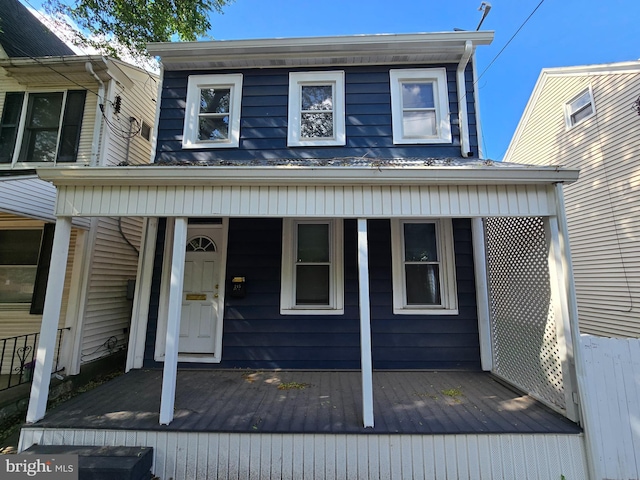 245 Beech St, Pottstown, PA 19464 - view of front facade with mansard roof and a porch