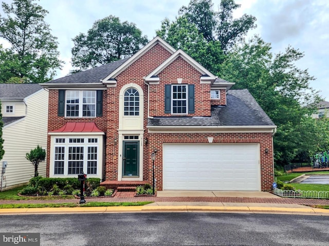 9120 Stonegarden Dr, Lorton, VA 22079 - view of front facade with brick siding and roof with shingles