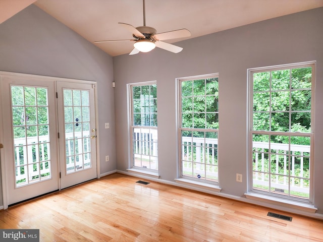 9120 Stonegarden Dr, Lorton, VA 22079 - doorway to outside with a ceiling fan, wood finished floors, vaulted ceiling, and baseboards