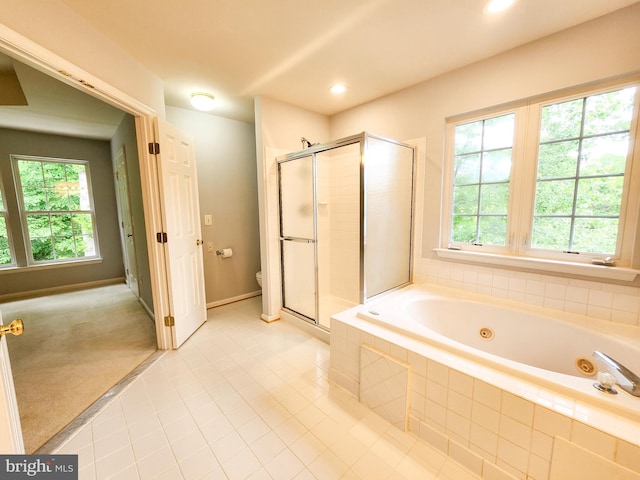 9120 Stonegarden Dr, Lorton, VA 22079 - full bath with a tub with jets, tile patterned floors, a shower stall, toilet, and recessed lighting