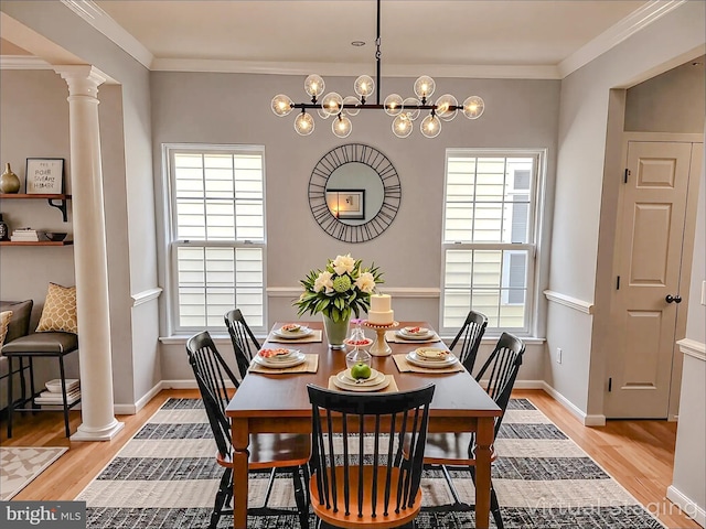 9120 Stonegarden Dr, Lorton, VA 22079 - dining room with ornate columns, light wood-type flooring, ornamental molding, baseboards, and a chandelier
