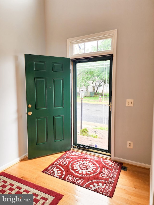9120 Stonegarden Dr, Lorton, VA 22079 - foyer with wood finished floors and baseboards
