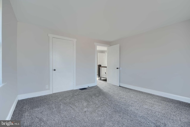 518 Fairview Ave, Baltimore, MD 21224 - unfurnished bedroom with carpet floors and baseboards