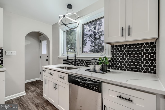 6505 Corkley Rd, Baltimore, MD 21237 - kitchen featuring dishwasher, a sink, arched walkways, and white cabinetry