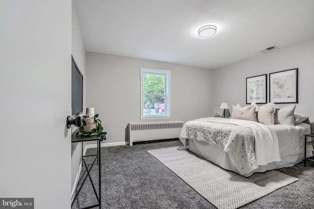 6505 Corkley Rd, Baltimore, MD 21237 - carpeted bedroom with radiator heating unit and baseboards