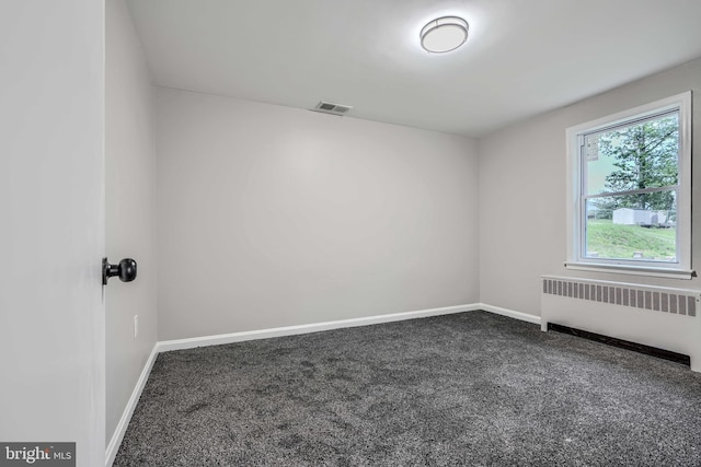 6505 Corkley Rd, Baltimore, MD 21237 - carpeted empty room featuring radiator and baseboards