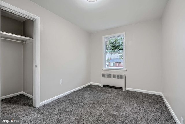 6505 Corkley Rd, Baltimore, MD 21237 - unfurnished bedroom with radiator, carpet, and baseboards