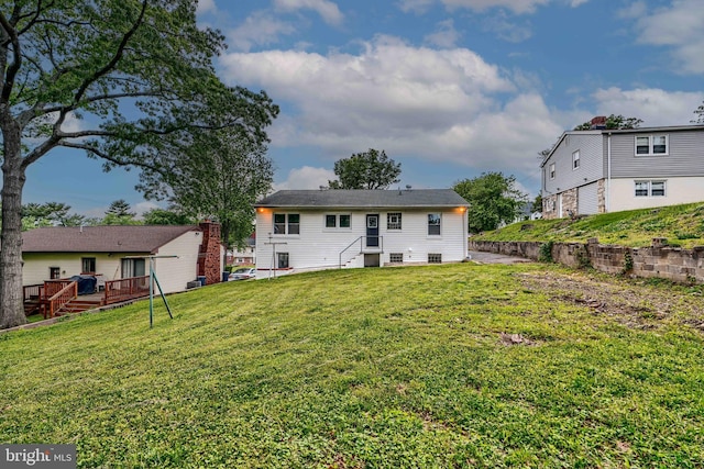 6505 Corkley Rd, Baltimore, MD 21237 - back of house with a yard and a deck
