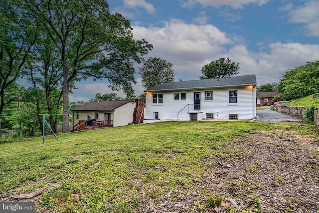 6505 Corkley Rd, Baltimore, MD 21237 - back of property featuring a yard and central AC