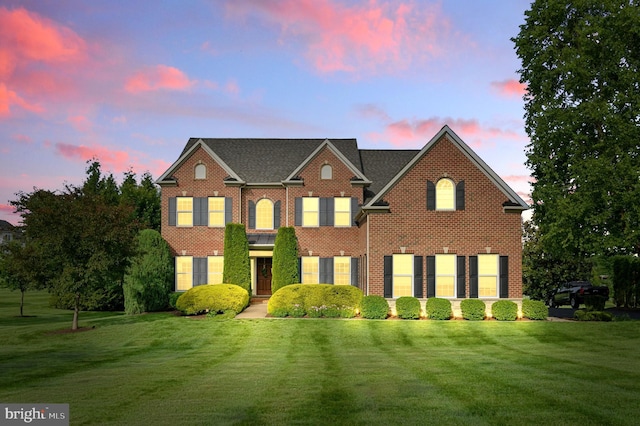 14894 Michele Dr, Glenelg, MD 21737 - colonial inspired home featuring a front lawn and brick siding