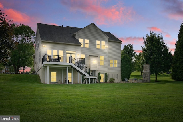 14894 Michele Dr, Glenelg, MD 21737 - back of house featuring stairs, a lawn, a wooden deck, and roof with shingles