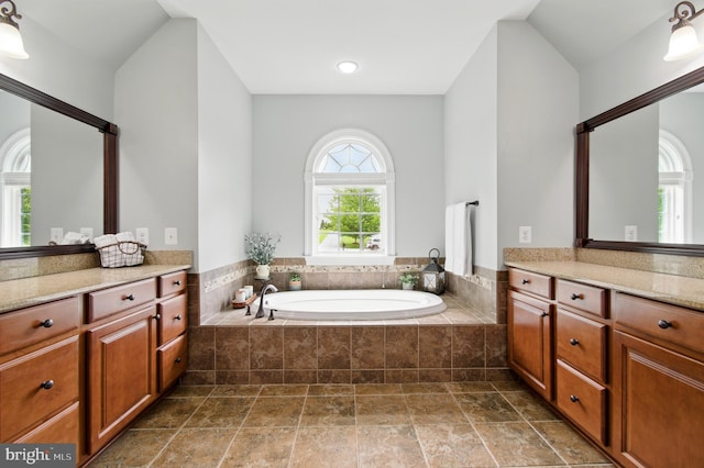 14894 Michele Dr, Glenelg, MD 21737 - bathroom featuring a bath, vanity, and stone finish floors