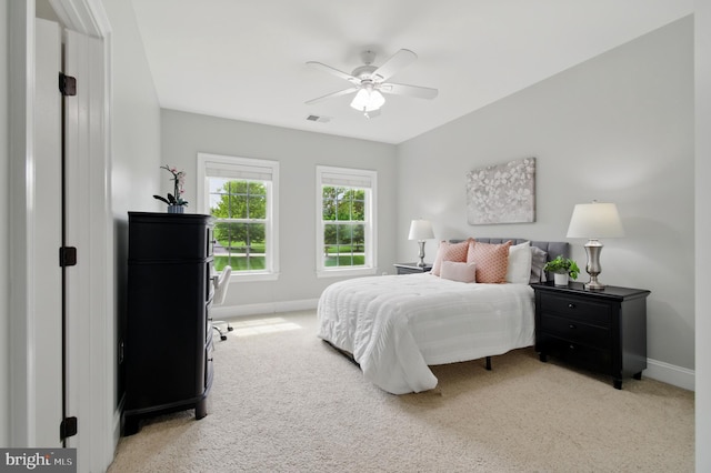 14894 Michele Dr, Glenelg, MD 21737 - bedroom with baseboards, light carpet, and ceiling fan