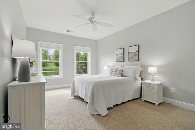 14894 Michele Dr, Glenelg, MD 21737 - bedroom with baseboards, light carpet, and a ceiling fan