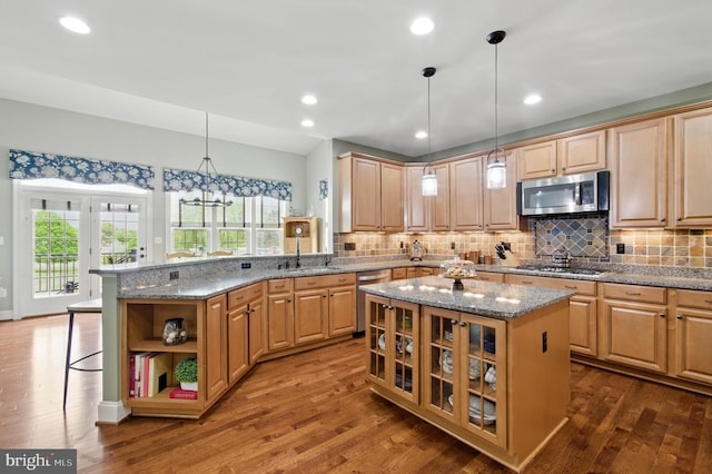 14894 Michele Dr, Glenelg, MD 21737 - kitchen with appliances with stainless steel finishes, a sink, open shelves, wood finished floors, and recessed lighting
