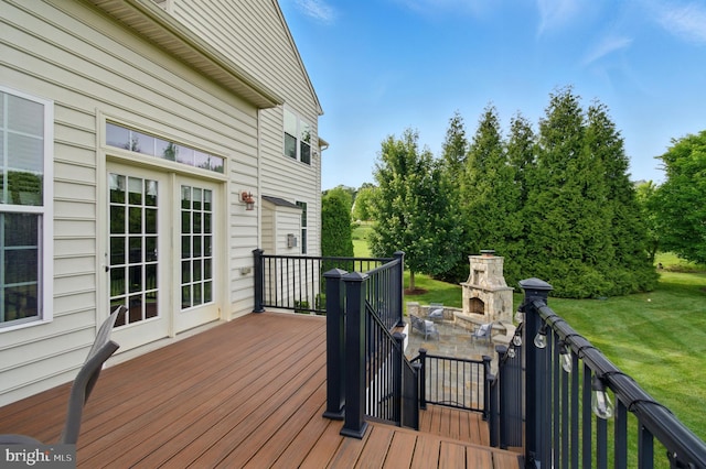 14894 Michele Dr, Glenelg, MD 21737 - deck featuring an outdoor stone fireplace, a yard, and view of scattered trees