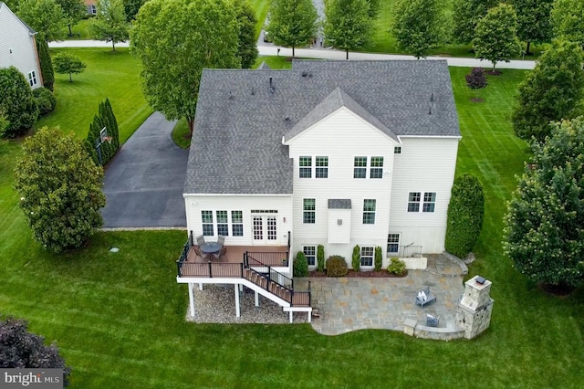 14894 Michele Dr, Glenelg, MD 21737 - back of house featuring stairway, a deck, a patio area, a lawn, and roof with shingles