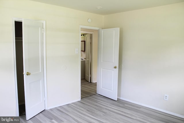 199 Kinsley Rd, Pemberton, NJ 08068 - unfurnished bedroom with light wood finished floors, baseboards, and a closet