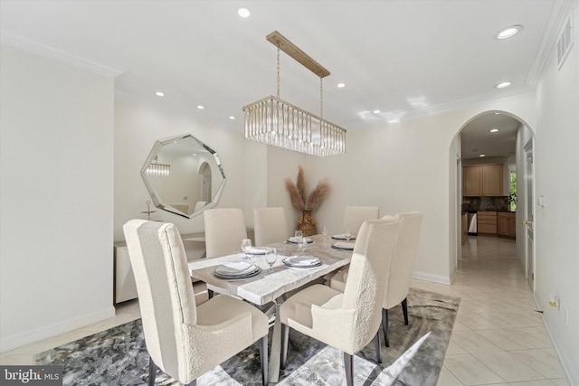 2 Collage Ct, Cherry Hill, NJ 08003 - dining space featuring arched walkways, crown molding, recessed lighting, light tile patterned flooring, and baseboards