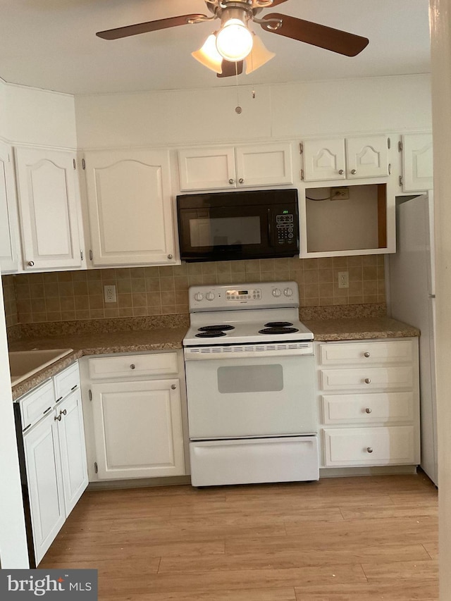 1002 Brinker Dr Unit 101, Hagerstown, MD 21740 - kitchen with white appliances, ceiling fan, and white cabinetry