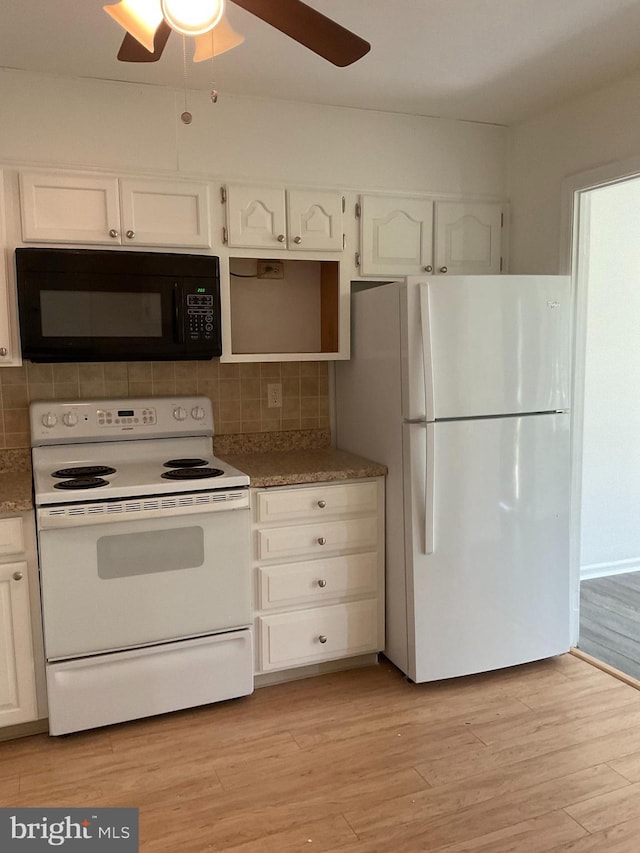 1002 Brinker Dr Unit 101, Hagerstown, MD 21740 - kitchen with white appliances, ceiling fan, white cabinetry, tasteful backsplash, and light wood finished floors