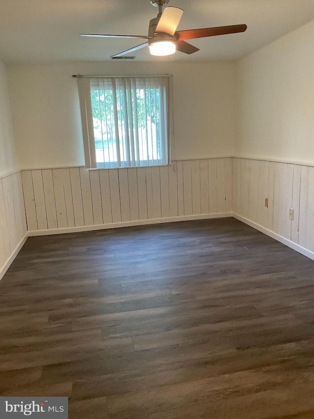 1002 Brinker Dr Unit 101, Hagerstown, MD 21740 - unfurnished room with ceiling fan, dark wood-style flooring, and wainscoting