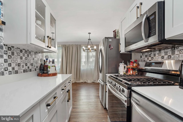 1200 S Arlington Ridge Rd Unit 314, Arlington, VA 22202 - kitchen featuring appliances with stainless steel finishes, light countertops, tasteful backsplash, and white cabinets