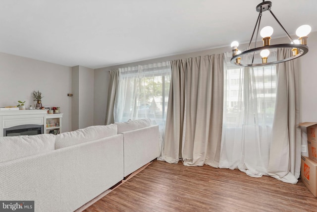 1200 S Arlington Ridge Rd Unit 314, Arlington, VA 22202 - living room featuring a chandelier and wood finished floors