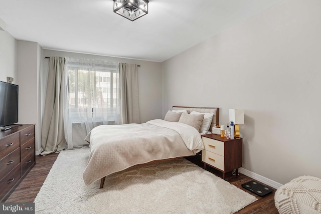 1200 S Arlington Ridge Rd Unit 314, Arlington, VA 22202 - bedroom featuring dark wood-style floors and baseboards