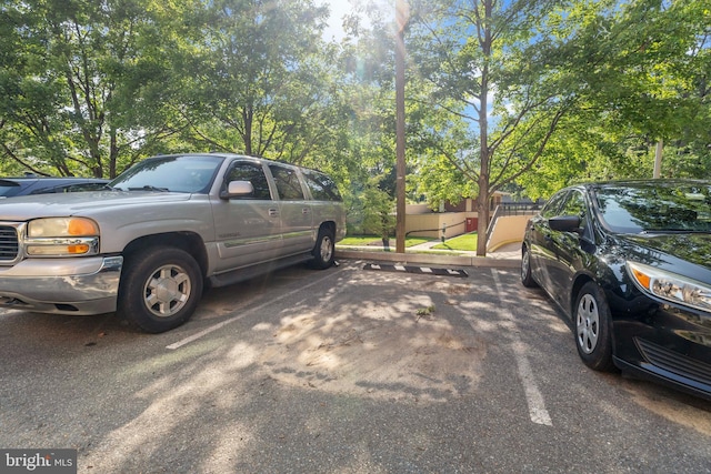 1200 S Arlington Ridge Rd Unit 314, Arlington, VA 22202 - uncovered parking lot with view of scattered trees