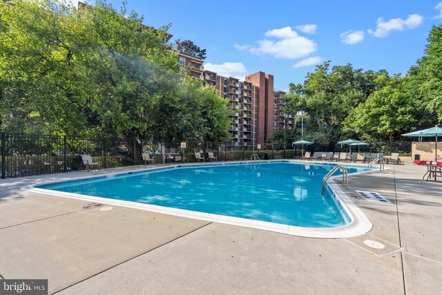 1200 S Arlington Ridge Rd Unit 314, Arlington, VA 22202 - community pool with a patio area