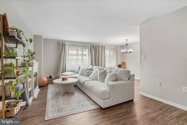 1200 S Arlington Ridge Rd Unit 314, Arlington, VA 22202 - living area with dark wood-style floors, a chandelier, a fireplace, and baseboards