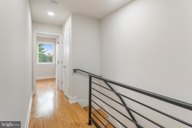 2220 13th St NE, Washington, DC 20018 - hall featuring an upstairs landing, light wood-style flooring, baseboards, and recessed lighting