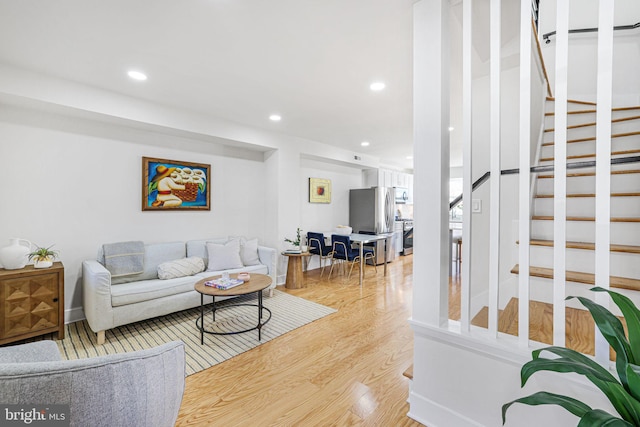 2220 13th St NE, Washington, DC 20018 - living area with stairs, wood finished floors, and recessed lighting