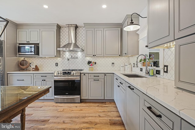 1343 Arabis Ct, Belcamp, MD 21017 - kitchen featuring appliances with stainless steel finishes, wall chimney range hood, a sink, gray cabinetry, and recessed lighting