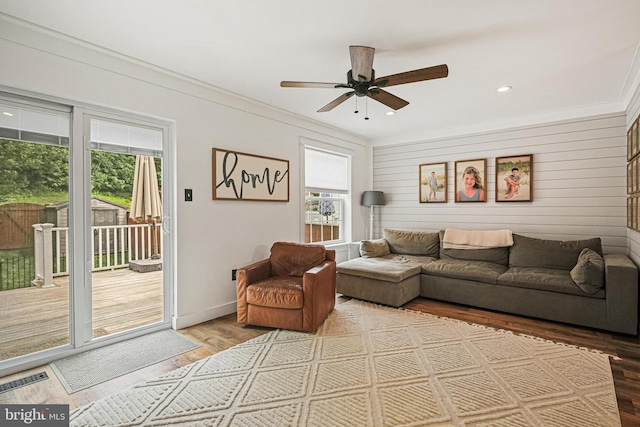 1343 Arabis Ct, Belcamp, MD 21017 - living area with wood finished floors, ornamental molding, a ceiling fan, recessed lighting, and baseboards