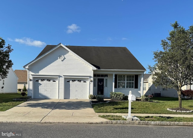 6 Sickler Ct, Sewell, NJ 08080 - view of front of home with driveway, a garage, and a front lawn