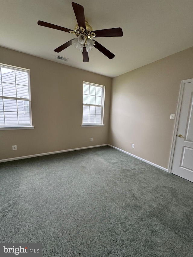 6 Sickler Ct, Sewell, NJ 08080 - spare room with ceiling fan, baseboards, and dark carpet