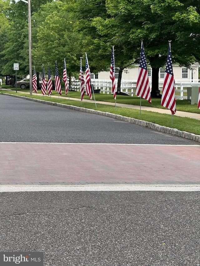 6 Sickler Ct, Sewell, NJ 08080 - view of asphalt street featuring curbs, sidewalks, and traffic signs
