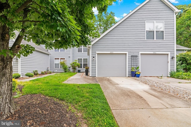 2932 Winters Chase Way, Annapolis, MD 21401 - view of front of home with concrete driveway, a front lawn, and a garage