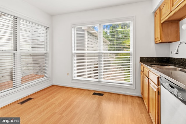 2932 Winters Chase Way, Annapolis, MD 21401 - kitchen with dishwasher, a sink, light wood finished floors, and baseboards