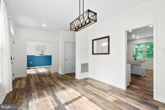 163 Hyde Park Ln, Charles Town, WV 25414 - unfurnished dining area featuring wood finished floors, recessed lighting, and baseboards