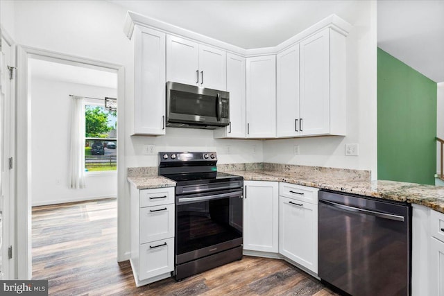 163 Hyde Park Ln, Charles Town, WV 25414 - kitchen featuring stainless steel appliances, dark wood-style floors, white cabinetry, and light stone counters