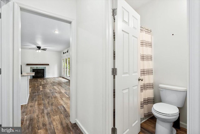 163 Hyde Park Ln, Charles Town, WV 25414 - hallway featuring dark wood-style floors and baseboards