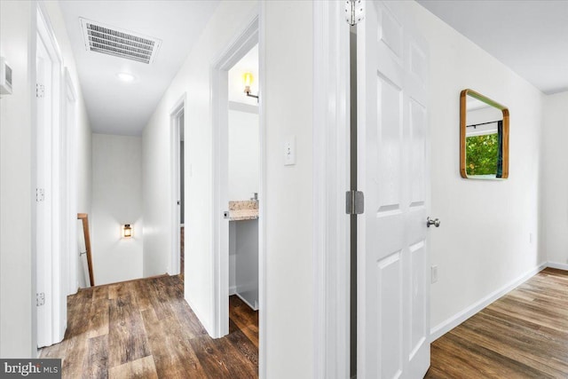 163 Hyde Park Ln, Charles Town, WV 25414 - hallway with wood finished floors and an upstairs landing